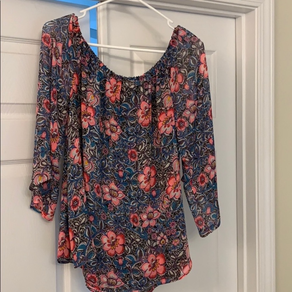 Express floral off the shoulder top.